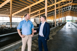 The Metzger-Petersen brothers from Backensholzer Hof in their new freestall barn. (Sustainable project: Backensholzer Hof)
